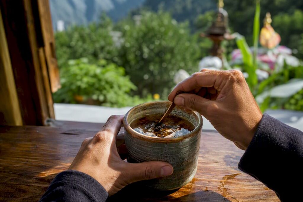 Shilajit resin dissolving in warm liquid