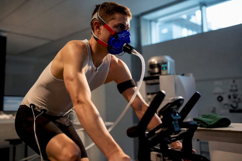 Athlete undergoing cycling VO2max assessment